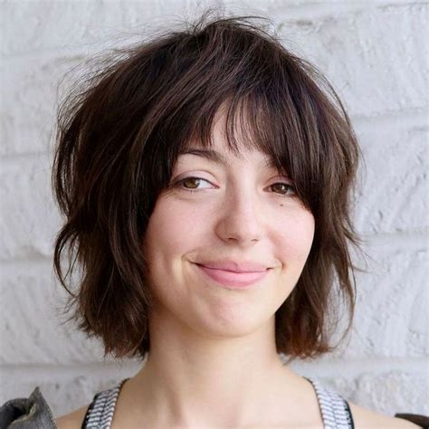 Layered Bob With Fringe This Bob Haircut With Bangs Boasts Jagged