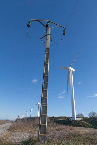 Pole And Windmills Stock Photo Download Image Now Agricultural