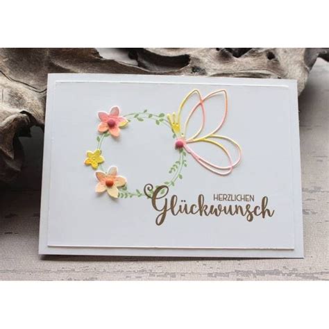 A Close Up Of A Card With Flowers On It