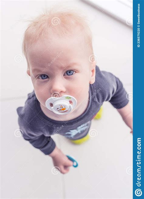 Pleasant Babe With A Blond Hair Stock Photo Image Of Home Sitting