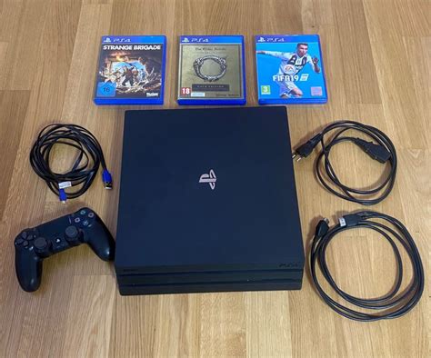 Playstation 4 Pro Inkl Controller Kabel Und 3 Games Kaufen Auf Ricardo