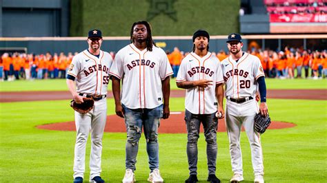 | Texans Rookies Throw Out First Pitch for the Houston Astros