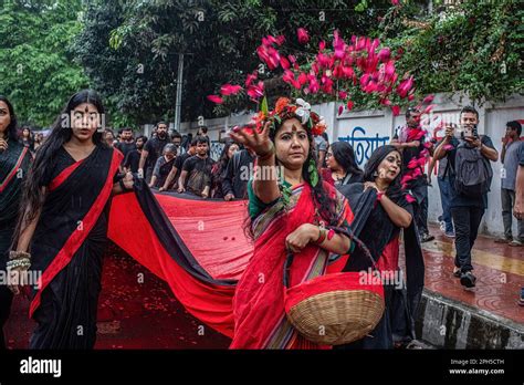 An Artist Seen Throwing Flowers During A Performance Of Lal Jatra Red