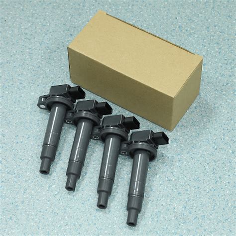 Set Of 4 Ignition Coils For Toyota Yaris Prius Echo 1NZ FE 2NZ FE 4Cyl