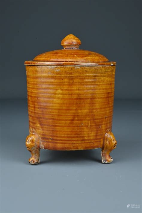 Bidlive A Chinese Amber Glazed Tripod Pottery Jar And Cover The