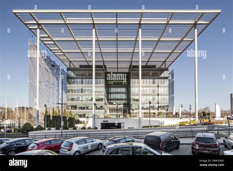 Facade Of An Office Building With A Metal Structure On Pillars As A