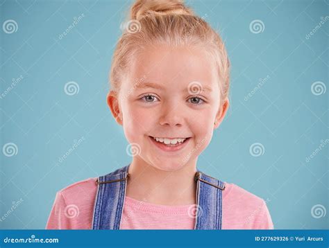 Beyond Cute A Cute Blonde Girl Isolated On A Blue Background Stock Photo Image Of Alone