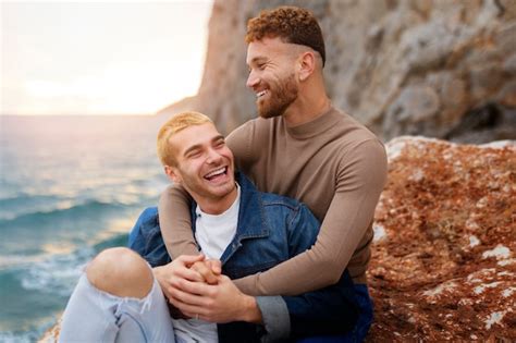 Free Photo Affectionate Gay Couple Spending Time On The Beach Together