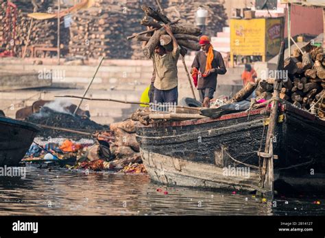 Traditional Funeral On The Banks Of The River Ganges Varanasi India