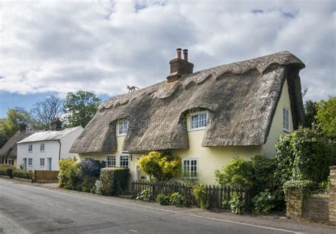 Thatched Cottages in an English Village Stock Image - Image of ...