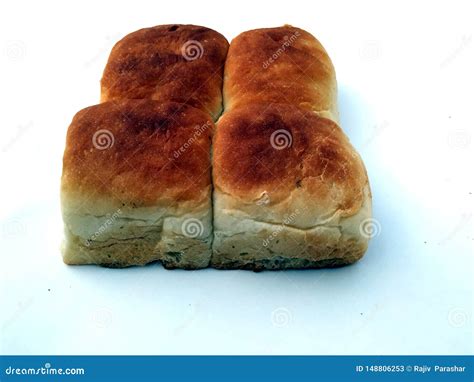 A Traditional Square Loaf Of Bread Is On A White Background Bread