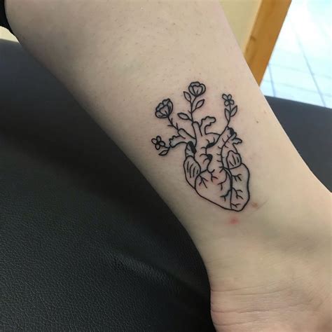 Little Simple Anatomical Heart With Flowers Tattoo Linework