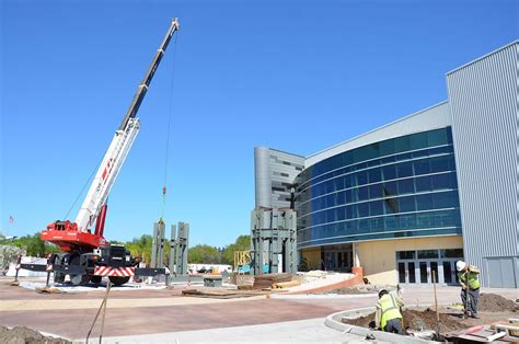 Shuttle Atlantis Under Wraps as Exhibit's Rocket Boosters Rise | Space