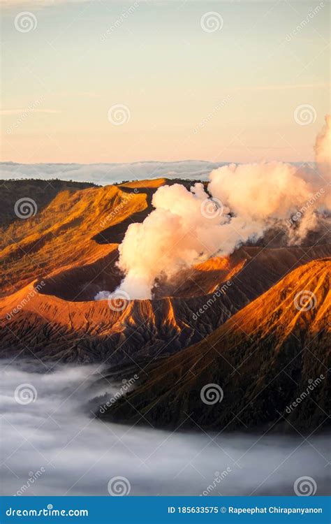 Bromo Volcano Crater Erupt Release Smoke With Twilight Sunrise Sky