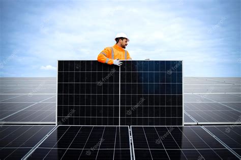 Premium Photo | Installing solar panels on the roof for producing eco friendly sustainable energy