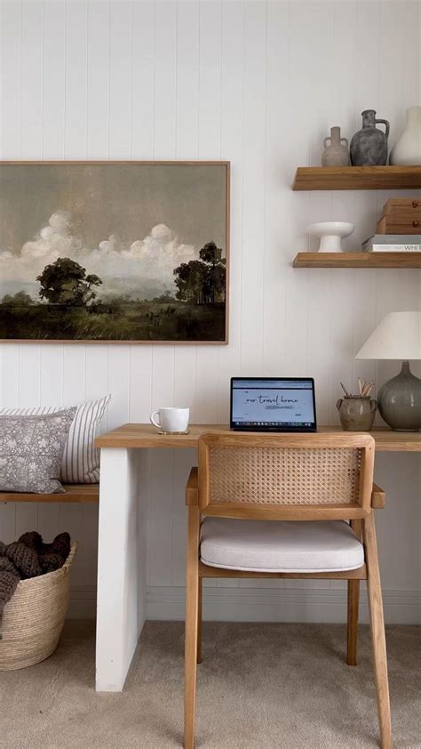 Stylish Home Office Ideas With Floating Shelves And Large Art Print