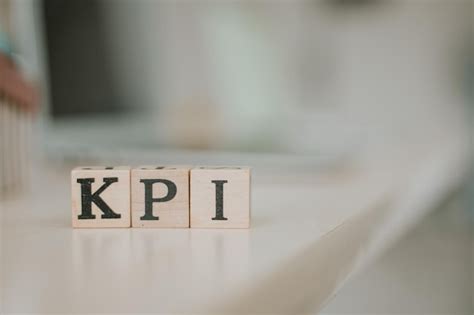 Premium Photo Kpi Letter On Block Cubes On Wooden Table Key