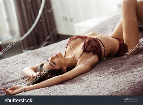 Gorgeous Brunette Woman Sexy Lingerie Lyingの写真素材今すぐ編集 756025579