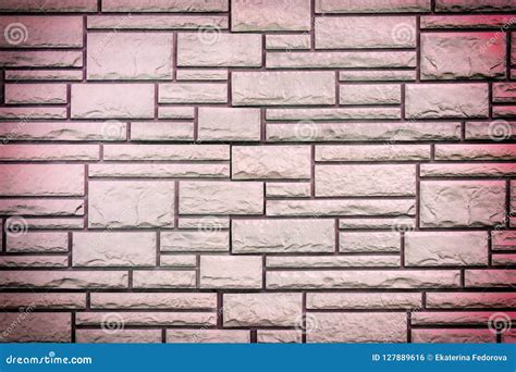 Wall Of Maroon Bricks Of Different Sizes Blank Background With Texture