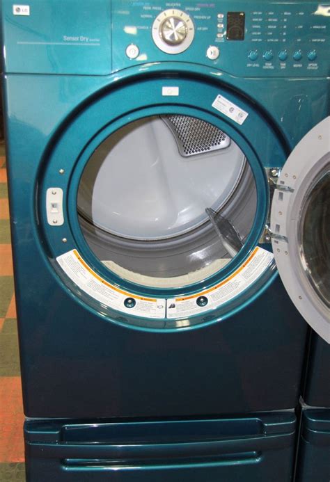 LG FRONT LOAD WASHER AND DRYER WITH PEDESTALS