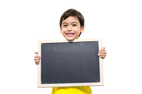 Niño Pequeño Que Sostiene Una Pizarra Foto de archivo Imagen de