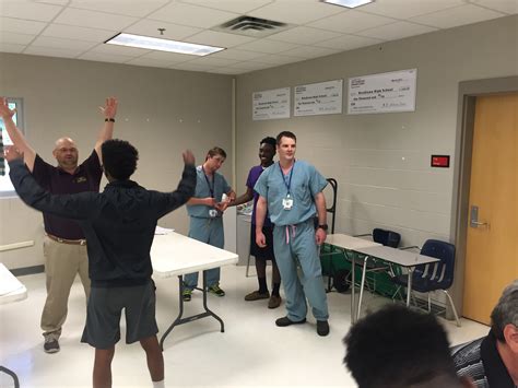 Parents protest against the woodlawn high school budget cut plans 23