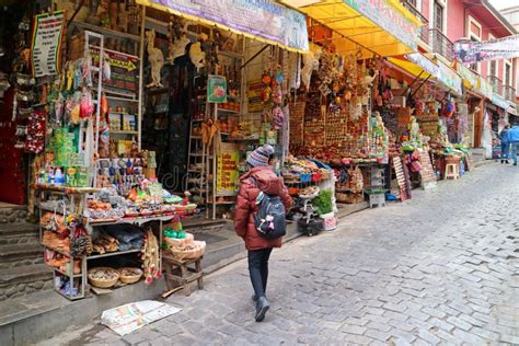 Female Tourist Exploring The Famous Witches Market Or Mercado De Las