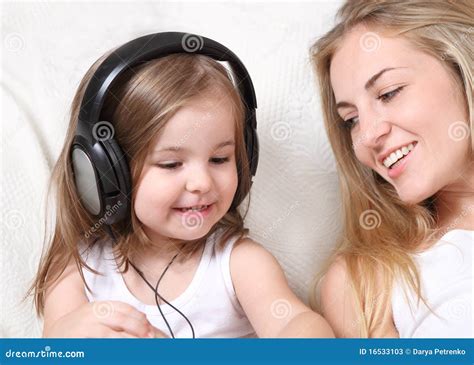 Mother and Daughter Listen To the Music Stock Image - Image of girl ...