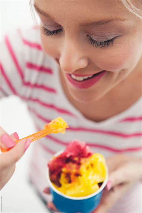 Woman Eating Ice Cream By Stocksy Contributor Lumina Stocksy