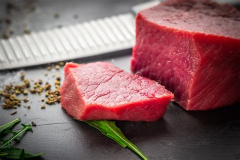 Cut Raw Beef Tenderloin Steak Filet Mignon With Seasonings Stock Image