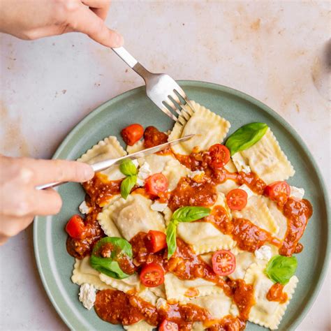 Osso Buco Ravioli And Beef Ragu Sauce With Feta Cherry Tomatoes And