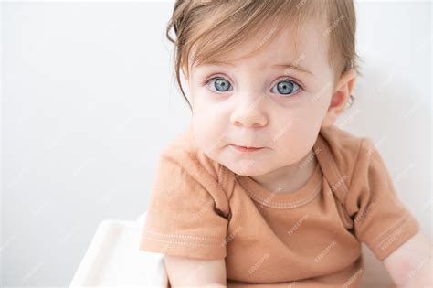 Cute Baby Girls With Brown Hair And Blue Eyes