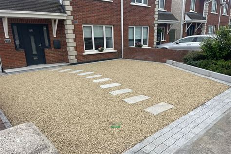 Gravelled Driveway With Silver Granite Cobbles And Bullnose Step In