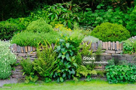 Garden Stone Wall Stock Photo - Download Image Now - Ornamental Garden ...