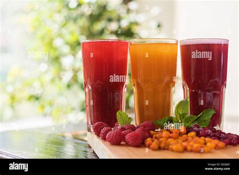 Fruit Drink With Cranberries Raspberries And Sea Buckthorn Stock Photo