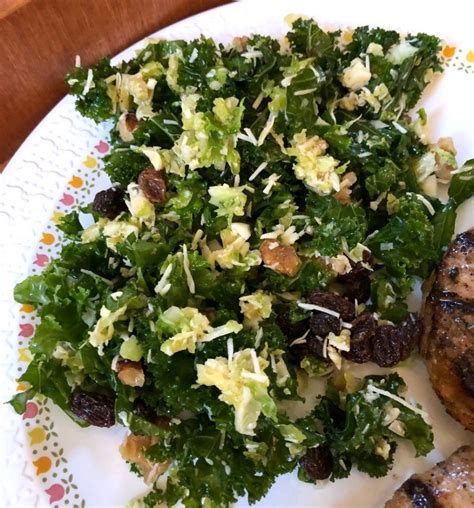 Kale And Brussels Sprout Salad With Walnuts Parmesan And Lemon Mustard