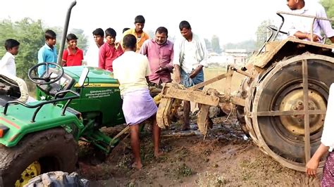 New Holland And Johndeere Tractors Stuck In Mud Video Dailymotion