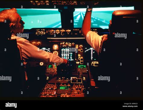 Boeing Jumbo Jet Pilots In The Cockpit Doing Final Take Off Checks