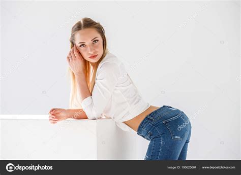 Portrait Sexy Blonde Girl Wearing Blue Jeans White Shirt Standing Stock Photo Schummyone