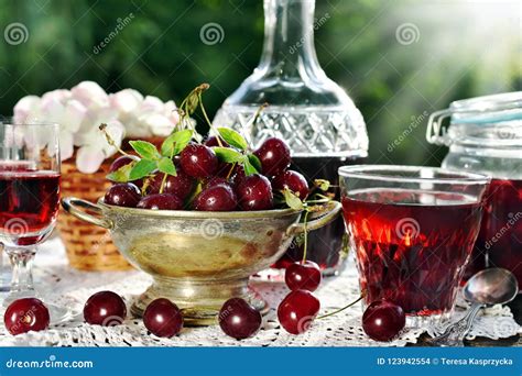 Cherry Liqueur In Crystal Carafe And Fresh Fruits Stock Photo Image