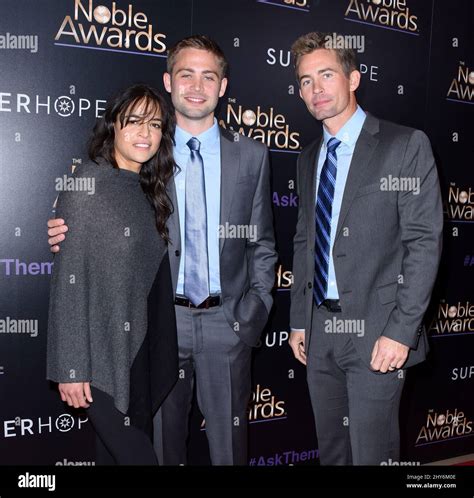 Michelle Rodriguez, Cody Walker, Caleb Walker attending the The 3rd ...