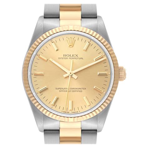 Rolex Oyster Perpetual Fluted Bezel Steel Yellow Gold Mens Watch