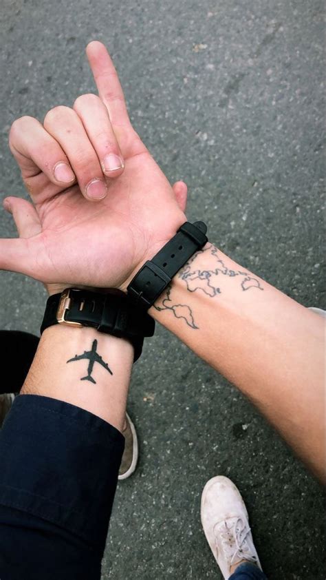 Unique Creative Travel Tattoo Ideas For Men In Wrist Tattoos