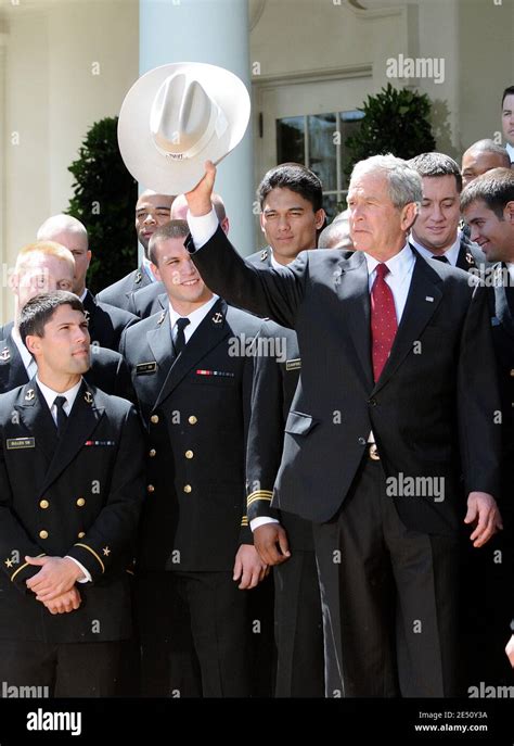 Us President George W Bush Carries On A Cowboy Hat Given To Him By