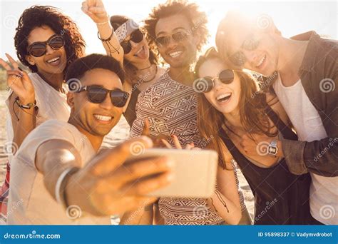 Group Of Multiracial Happy Friends Taking Selfie And Having Fun Stock