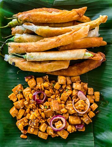 Top View Of Tofu In Peanut Garlic Sauce And Dynamite Lumpia Philippine Appetizers Or Food ...