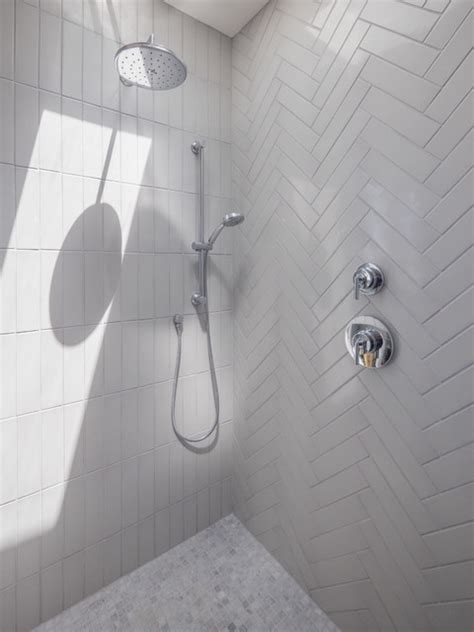 Transform Your Bathroom With Gray Herringbone Tile Discover The