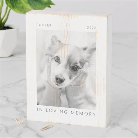 a wooden photo frame with a dog's face and the words in loving memory ...