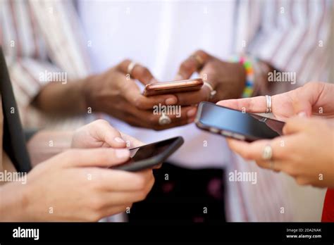 Hands Holding Mobile Phones Hi Res Stock Photography And Images Alamy