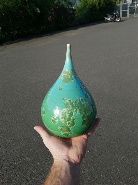 Copper Carbonate And Rutile Crystalline Glaze On A Porcelain Wheel